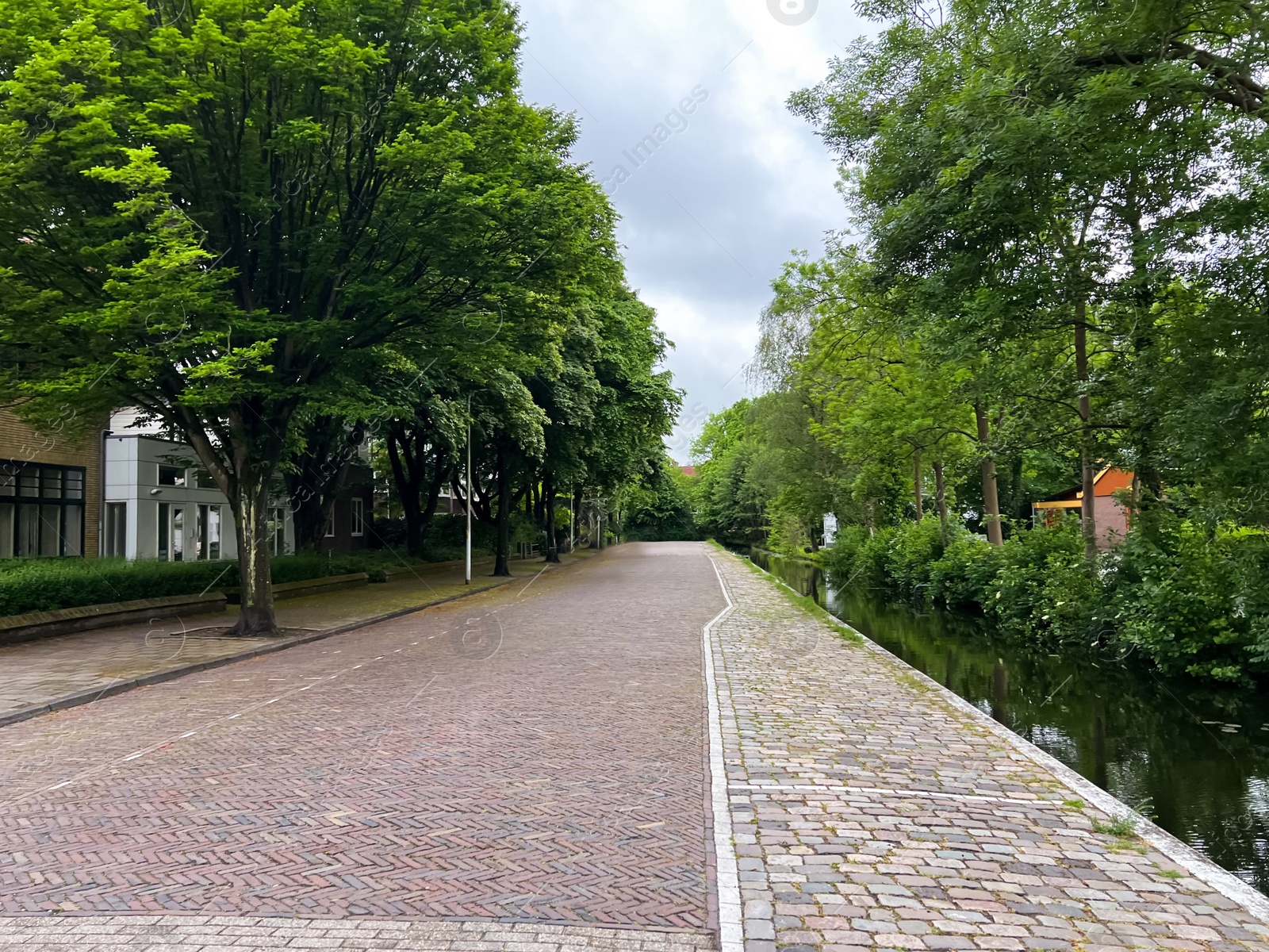 Photo of Beautiful view of city street and canal