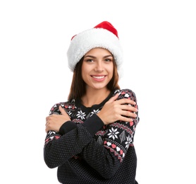 Photo of Young beautiful woman in Santa hat on white background. Christmas celebration