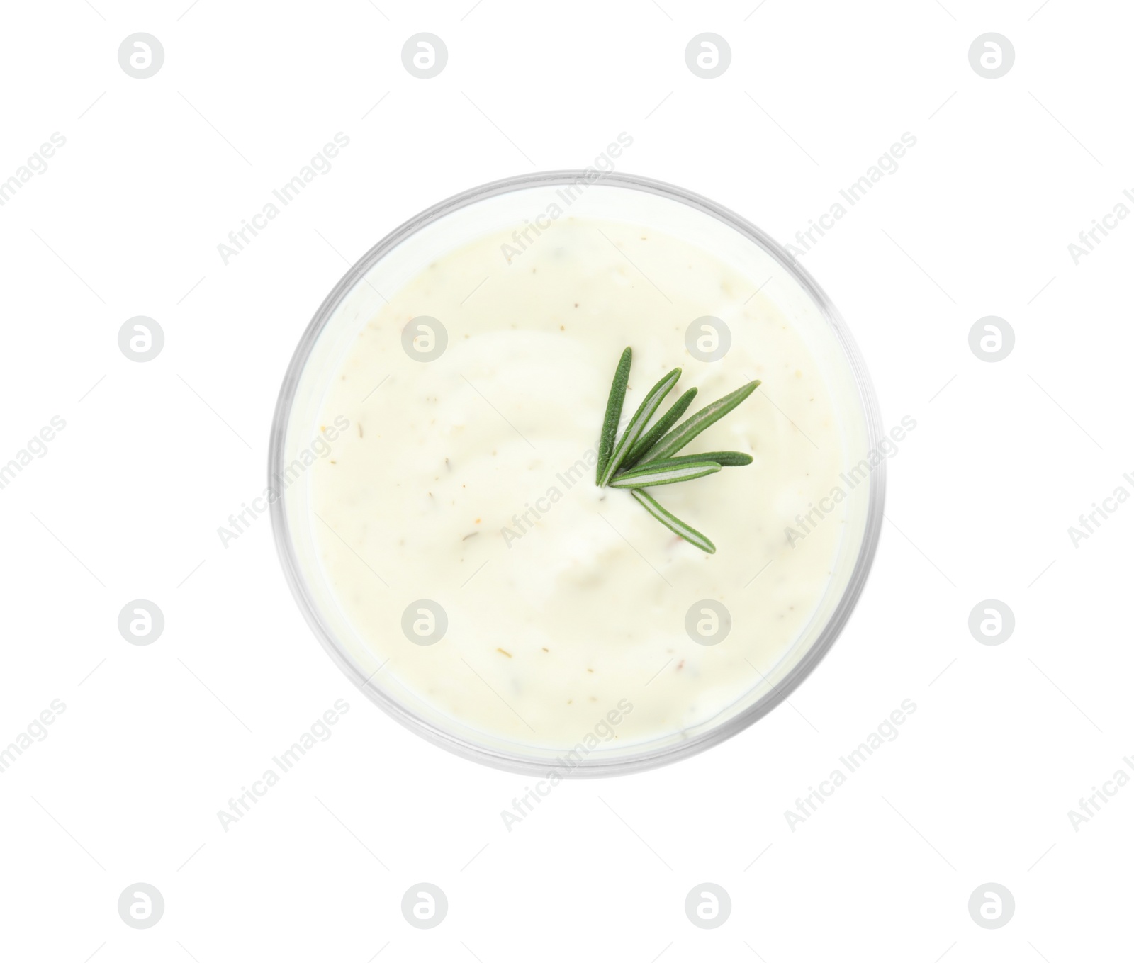 Photo of Glass bowl of garlic sauce on white background, top view