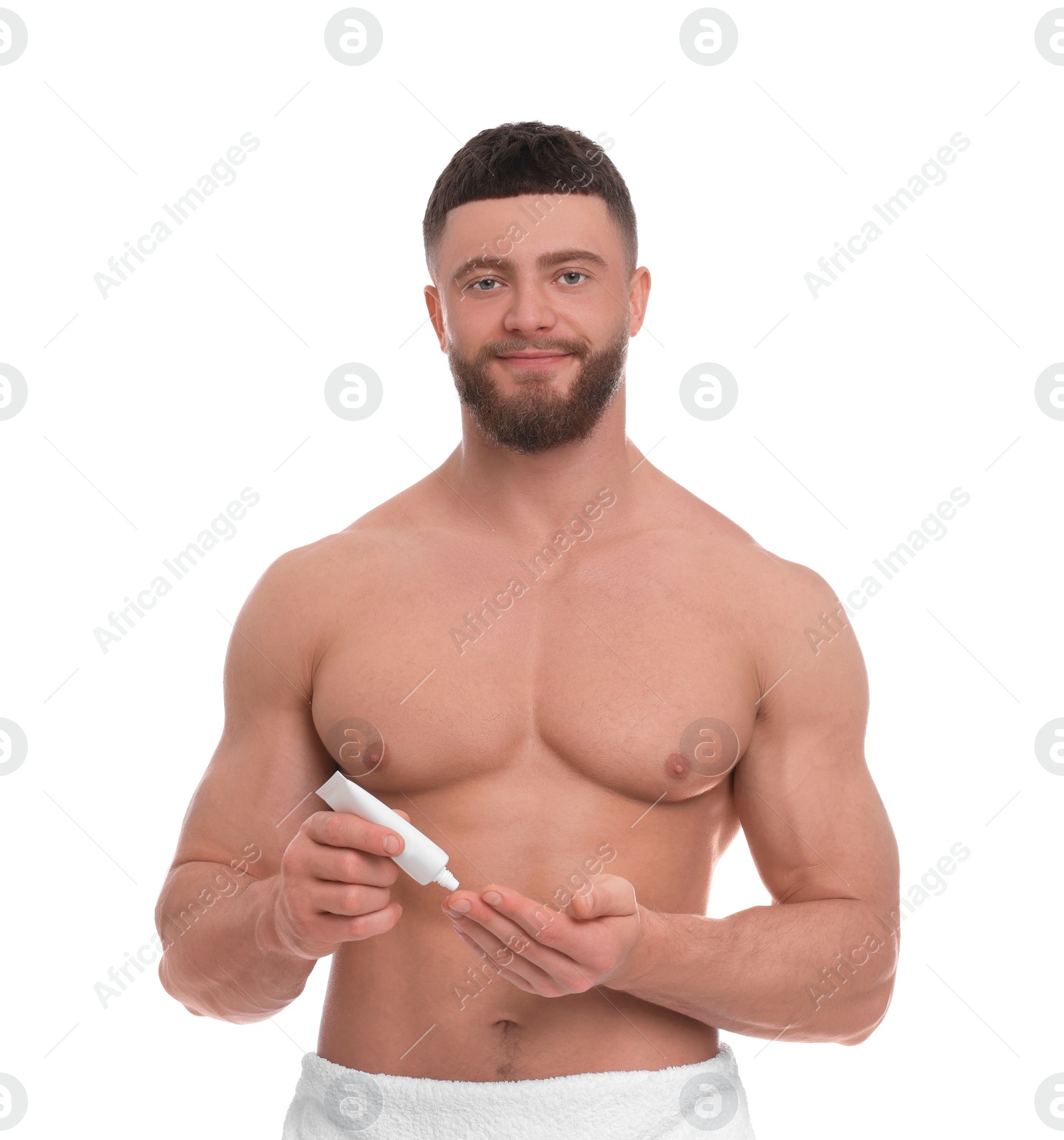 Photo of Handsome man applying body cream on white background
