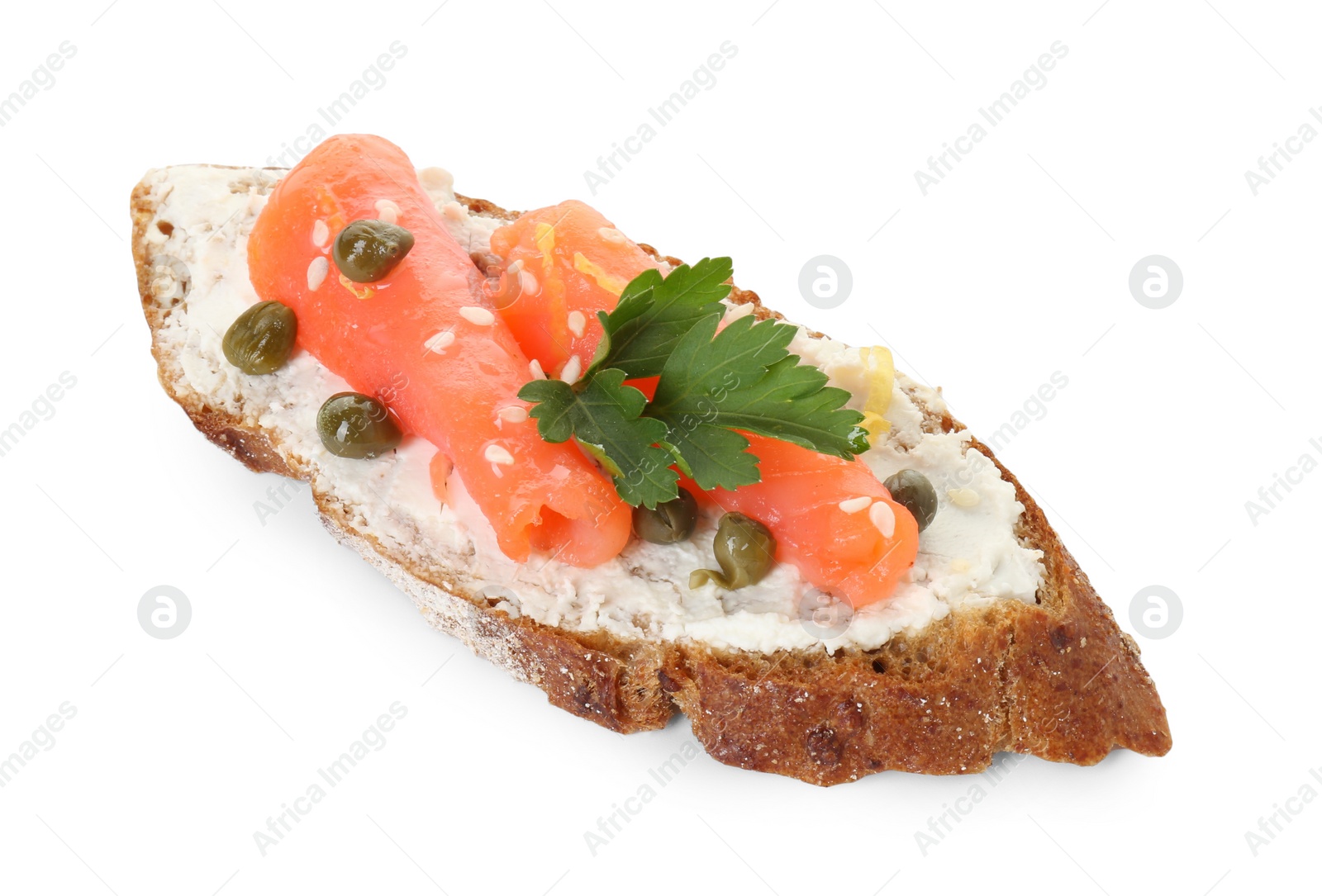 Photo of Tasty canape with salmon, capers and cream cheese isolated on white
