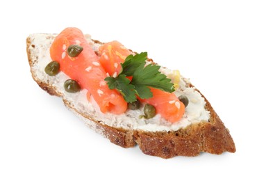 Photo of Tasty canape with salmon, capers and cream cheese isolated on white