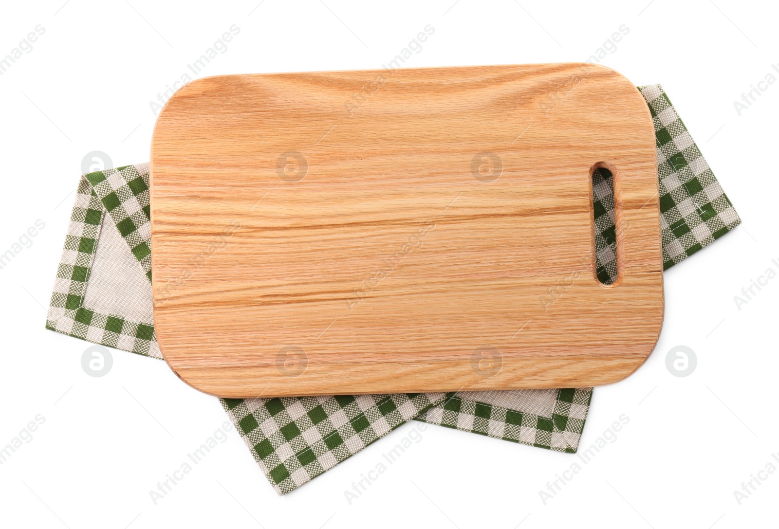 Photo of Wooden cutting board and checkered towel on white background, top view