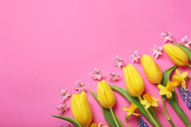 Beautiful different flowers on pink background, flat lay. Space for text