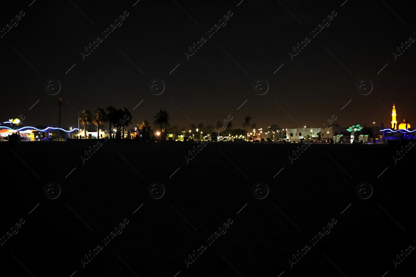 Photo of DUBAI, UNITED ARAB EMIRATES - NOVEMBER 03, 2018: Night landscape with illuminated city