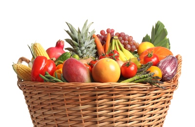Photo of Basket with assortment of fresh organic fruits and vegetables on white background, closeup