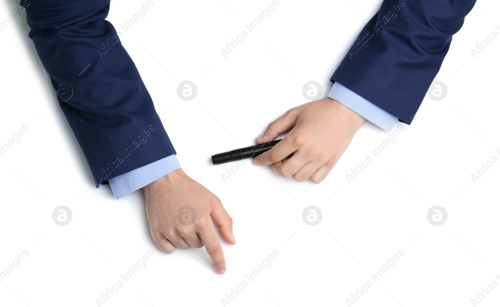 Photo of Man with marker on white background, top view. Closeup of hands