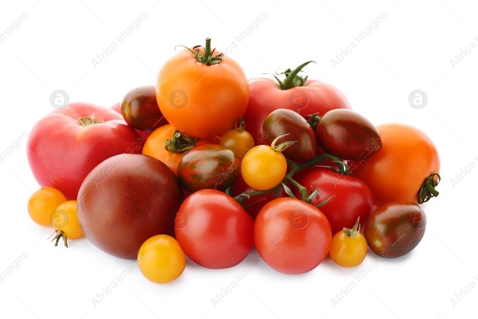 Photo of Heap of fresh ripe red and yellow tomatoes on white background