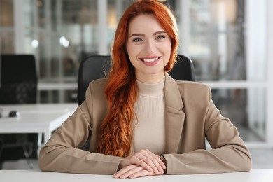 Happy woman having video call at white desk in office, view from web camera