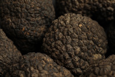 Photo of Closeup view of fresh whole black truffles