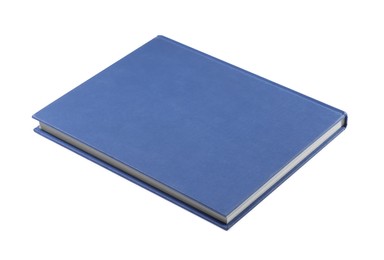 Photo of One closed blue hardcover book isolated on white