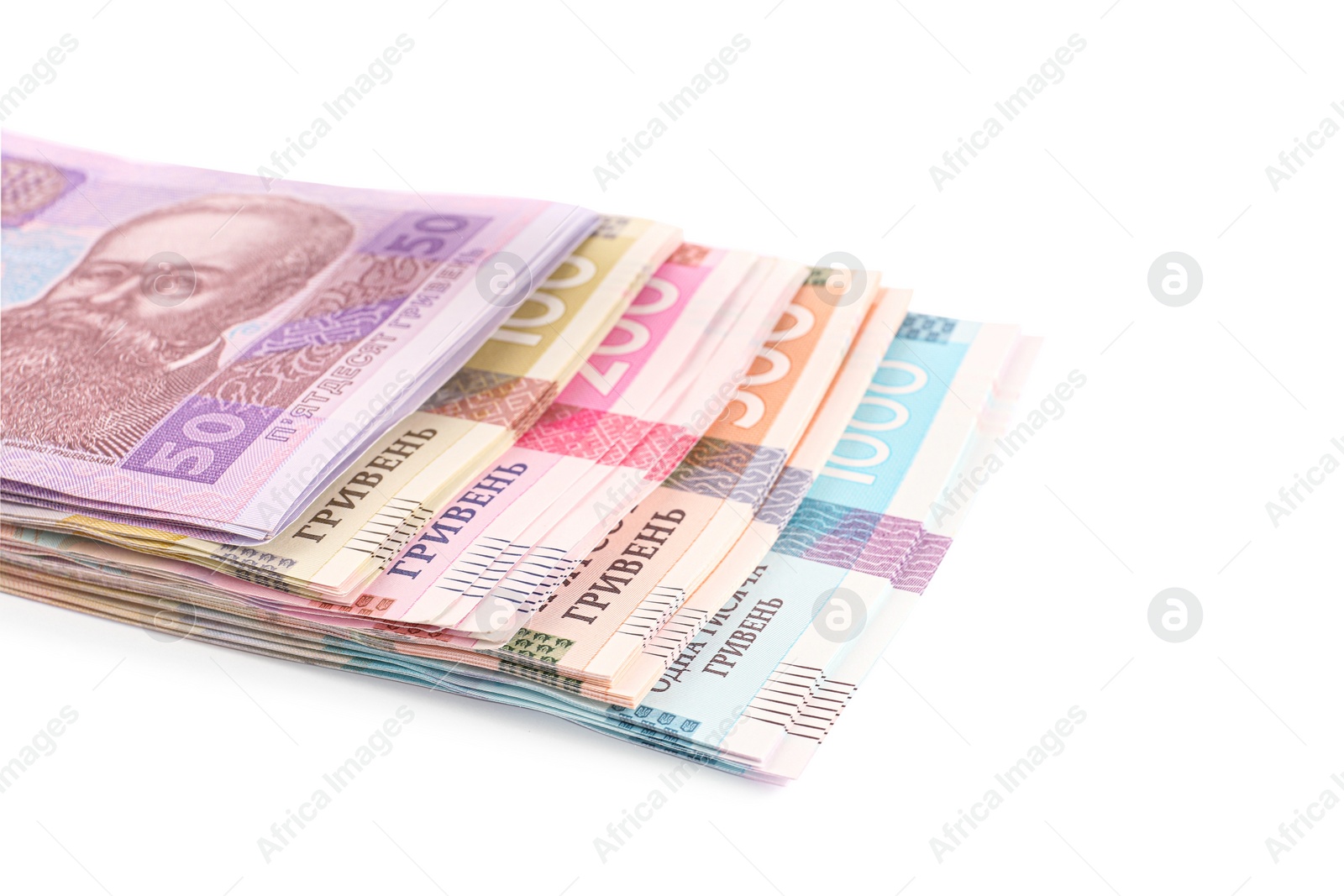 Photo of Ukrainian money on white background, closeup. National currency