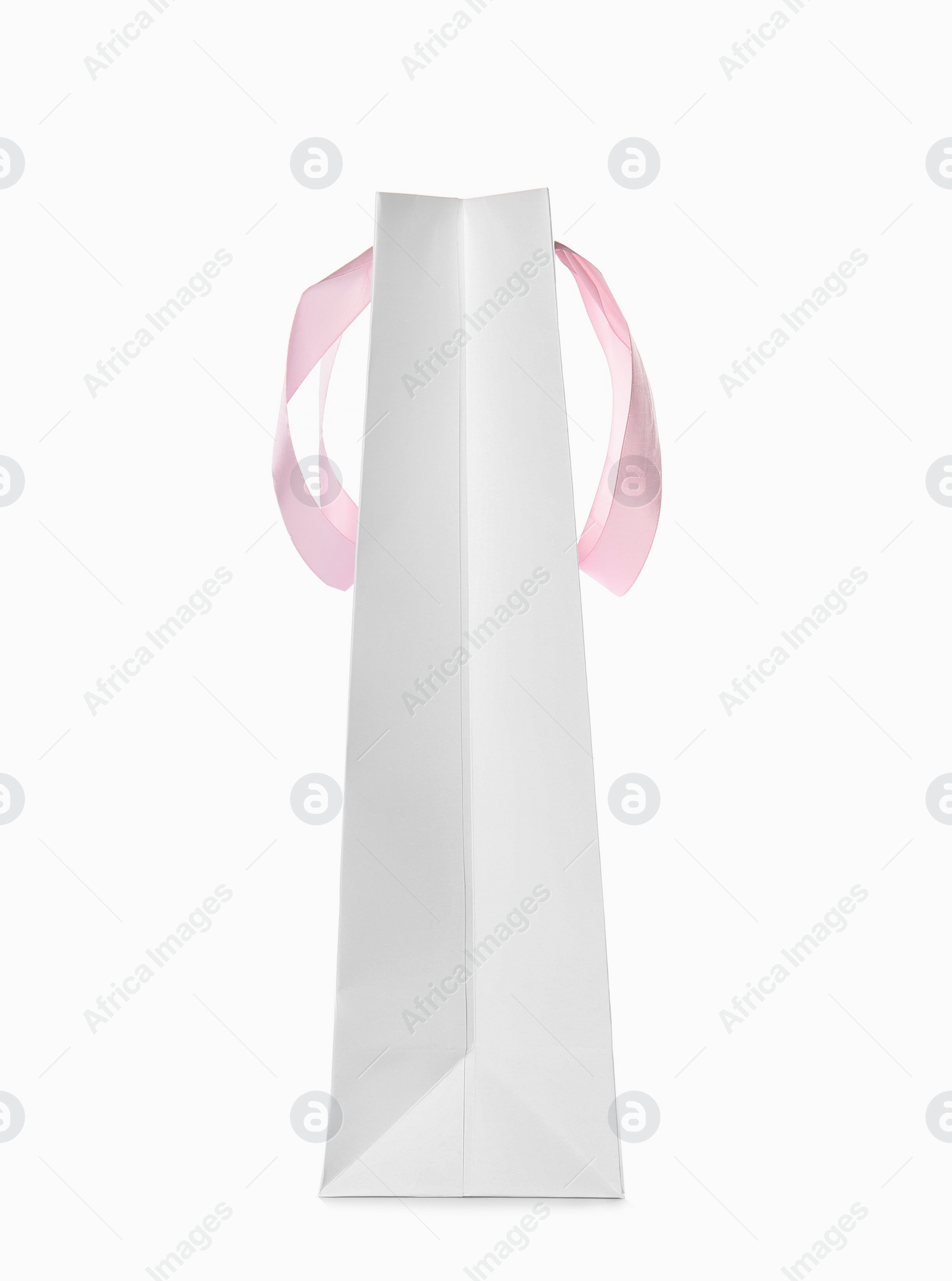 Photo of Paper shopping bag isolated on white, side view