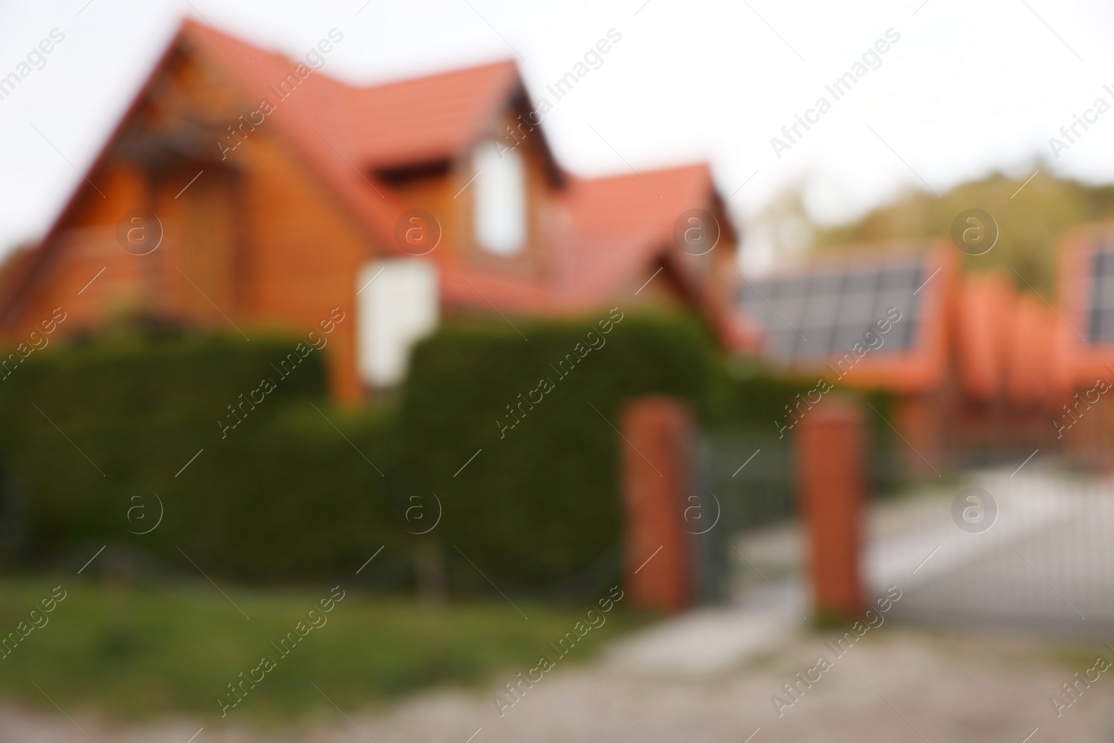 Photo of Beautiful houses outdoors, blurred view. Real estate for rent