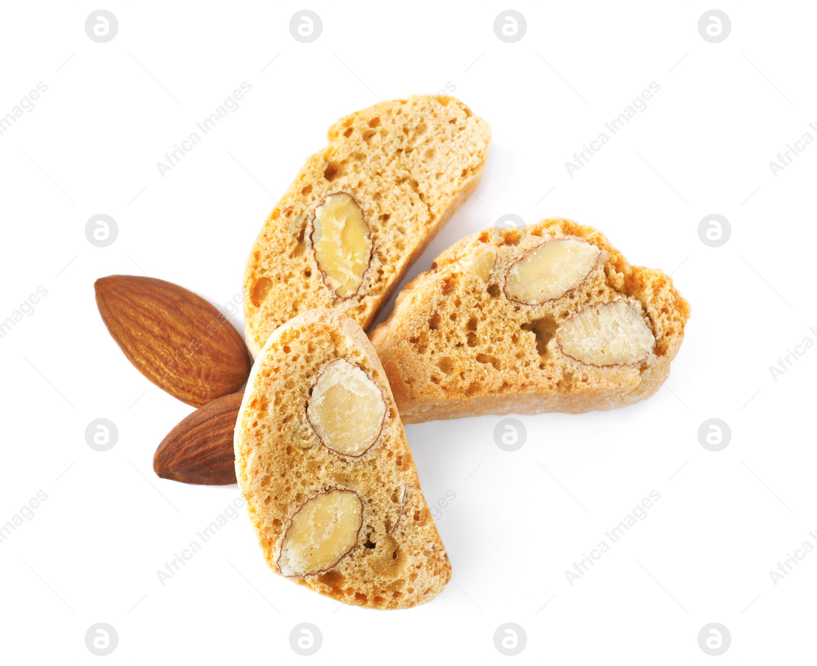 Photo of Slices of tasty cantucci and nuts on white background, top view. Traditional Italian almond biscuits