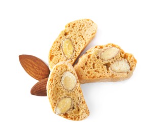 Slices of tasty cantucci and nuts on white background, top view. Traditional Italian almond biscuits