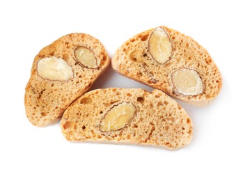 Photo of Slices of tasty cantucci on white background, top view. Traditional Italian almond biscuits