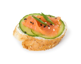 Photo of Tasty canape with salmon, cucumber and cream cheese isolated on white