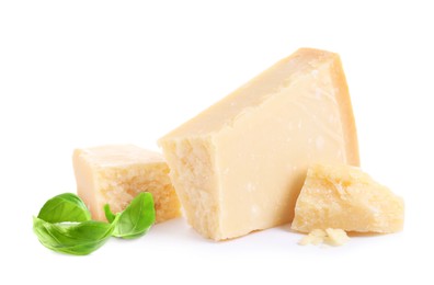 Image of Delicious parmesan cheese and basil on white background