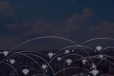 Image of Picturesque view of city with buildings and wi-fi symbols