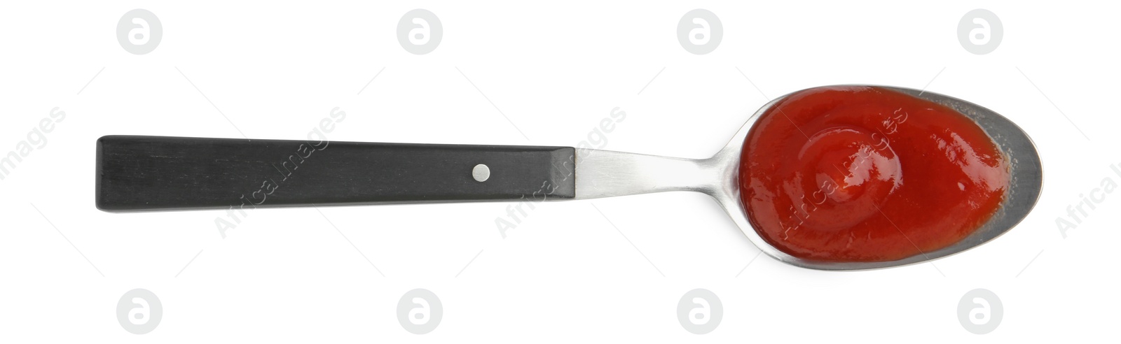 Tasty ketchup with spoon isolated on white, top view. Tomato sauce Photo of Tasty ketchup with spoon isolated on white, top view. Tomato sauce