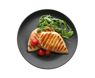 Photo of Tasty grilled chicken fillets with tomatoes and arugula isolated on white, top view