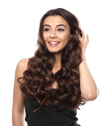 Photo of Beautiful woman with shiny wavy hair on white background