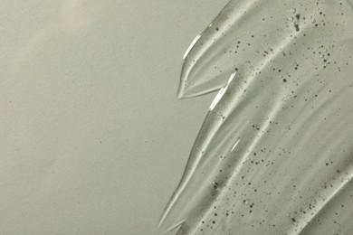 Photo of Cosmetic gel on light background, top view. Space for text