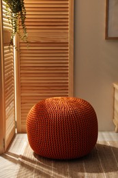 Stylish comfortable pouf in room. Home design