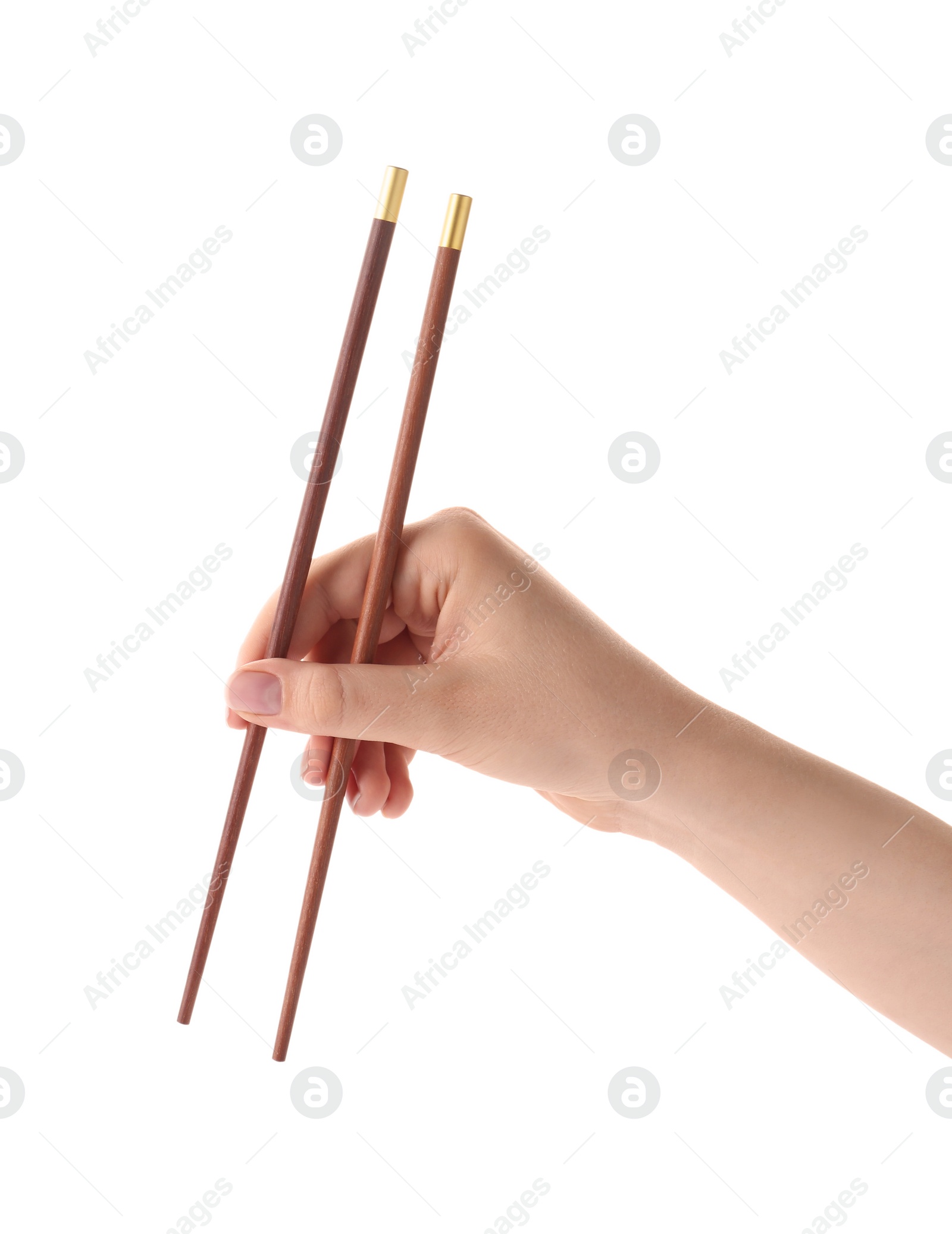 Photo of Woman holding pair of wooden chopsticks on white background, closeup