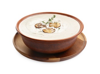 Photo of Fresh homemade mushroom soup in ceramic bowl isolated on white