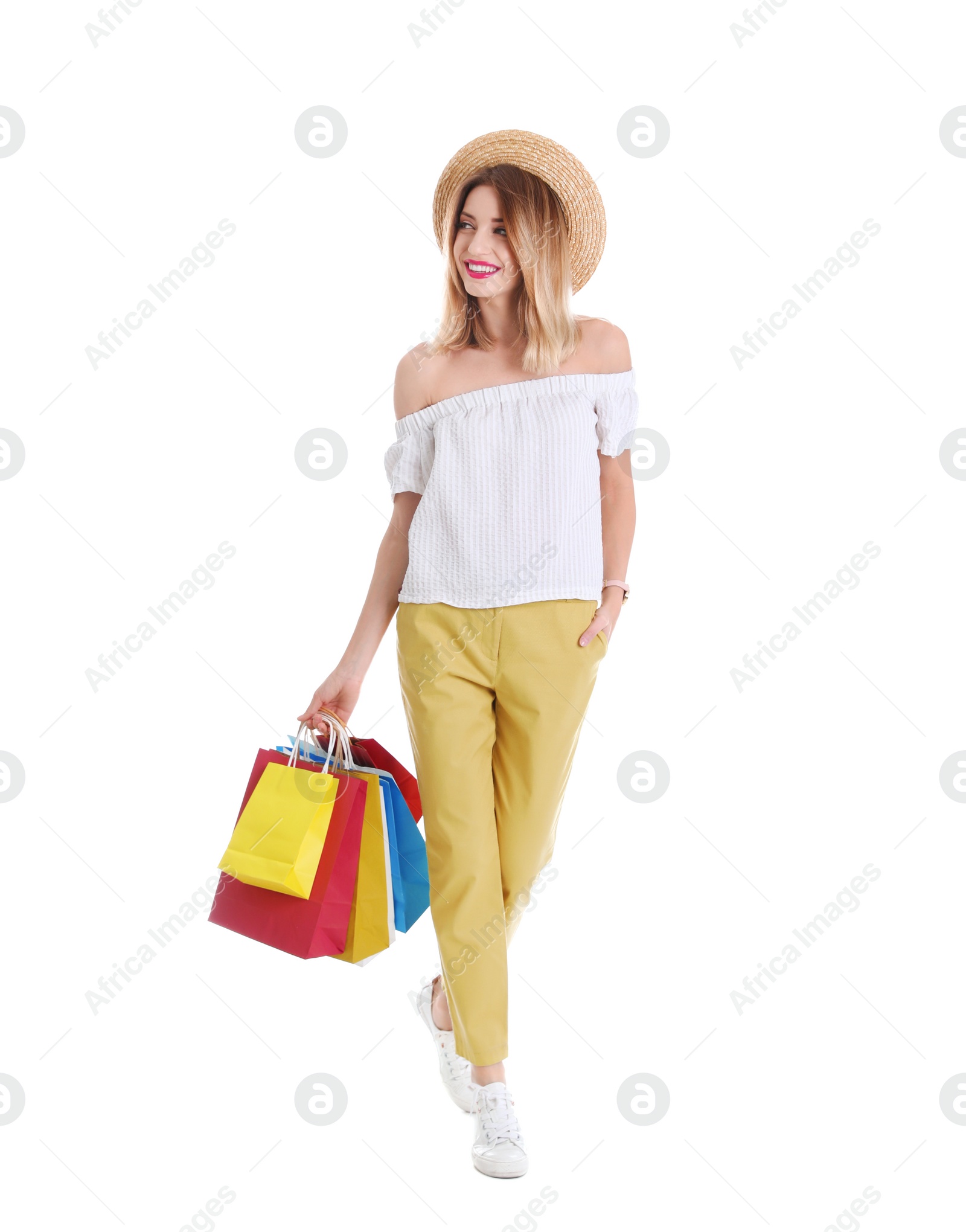 Photo of Beautiful young woman with shopping bags on white background