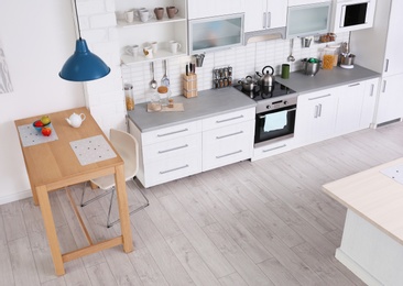 Photo of Modern kitchen interior, view through CCTV camera