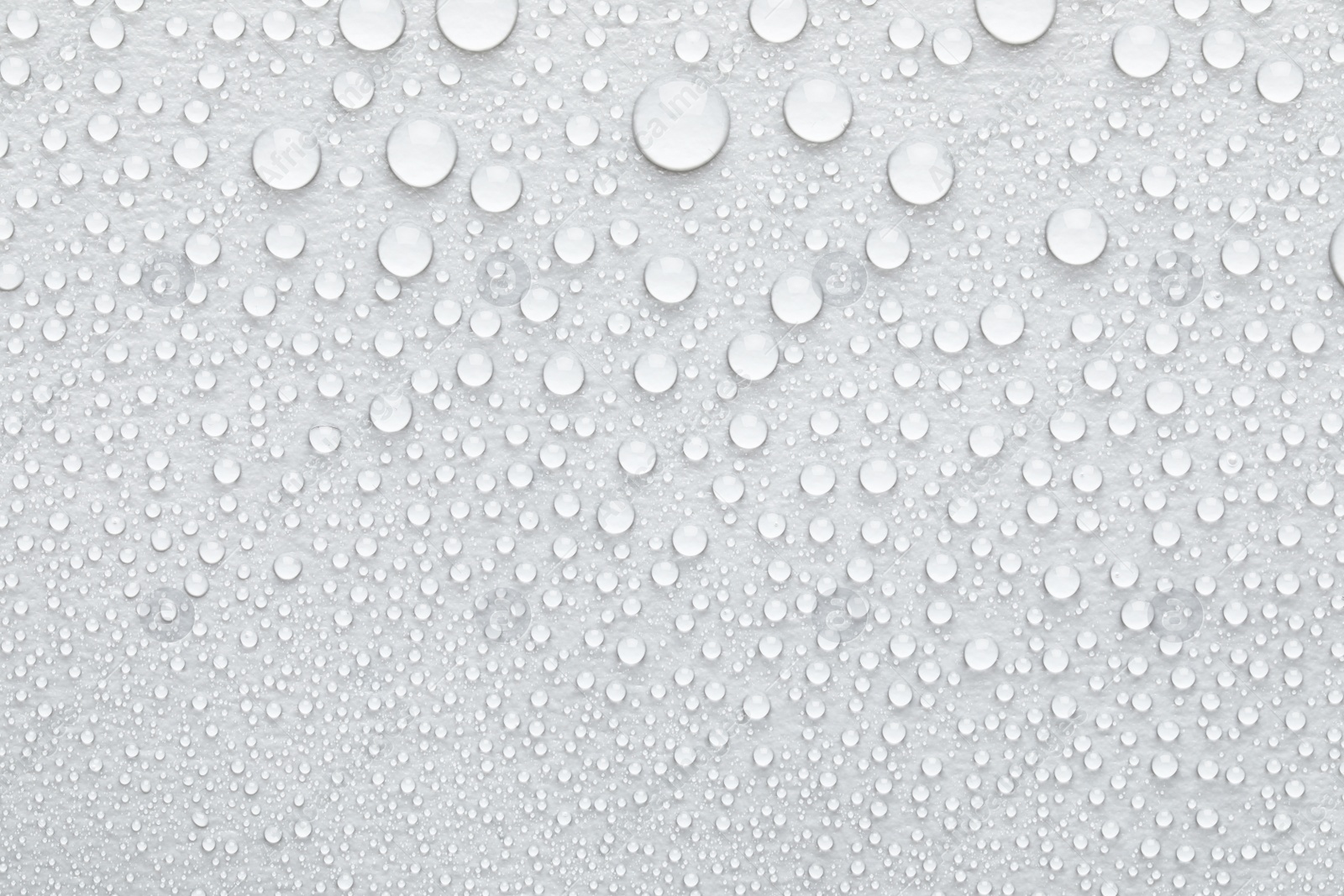 Image of Water drops on white background, top view