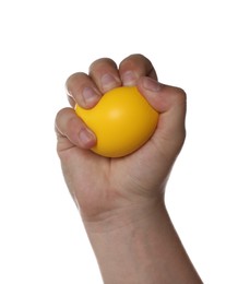 Photo of Man squeezing yellow stress ball on white background, closeup