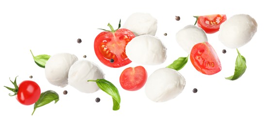 Image of Mozzarella cheese balls, tomatoes, basil leaves and peppercorns for caprese salad flying on white background. Banner design