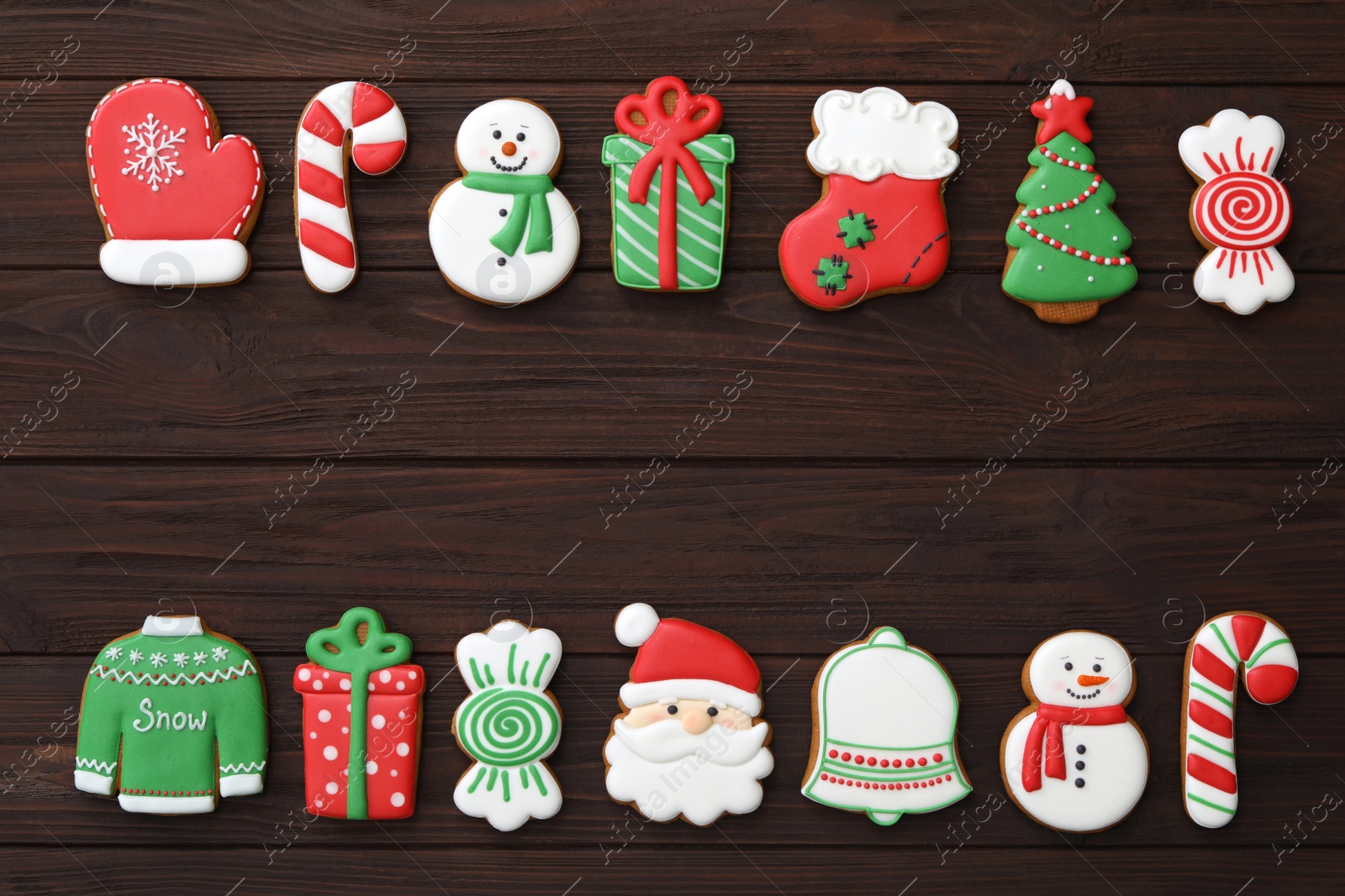 Photo of Many different delicious Christmas cookies on wooden table, flat lay. Space for text