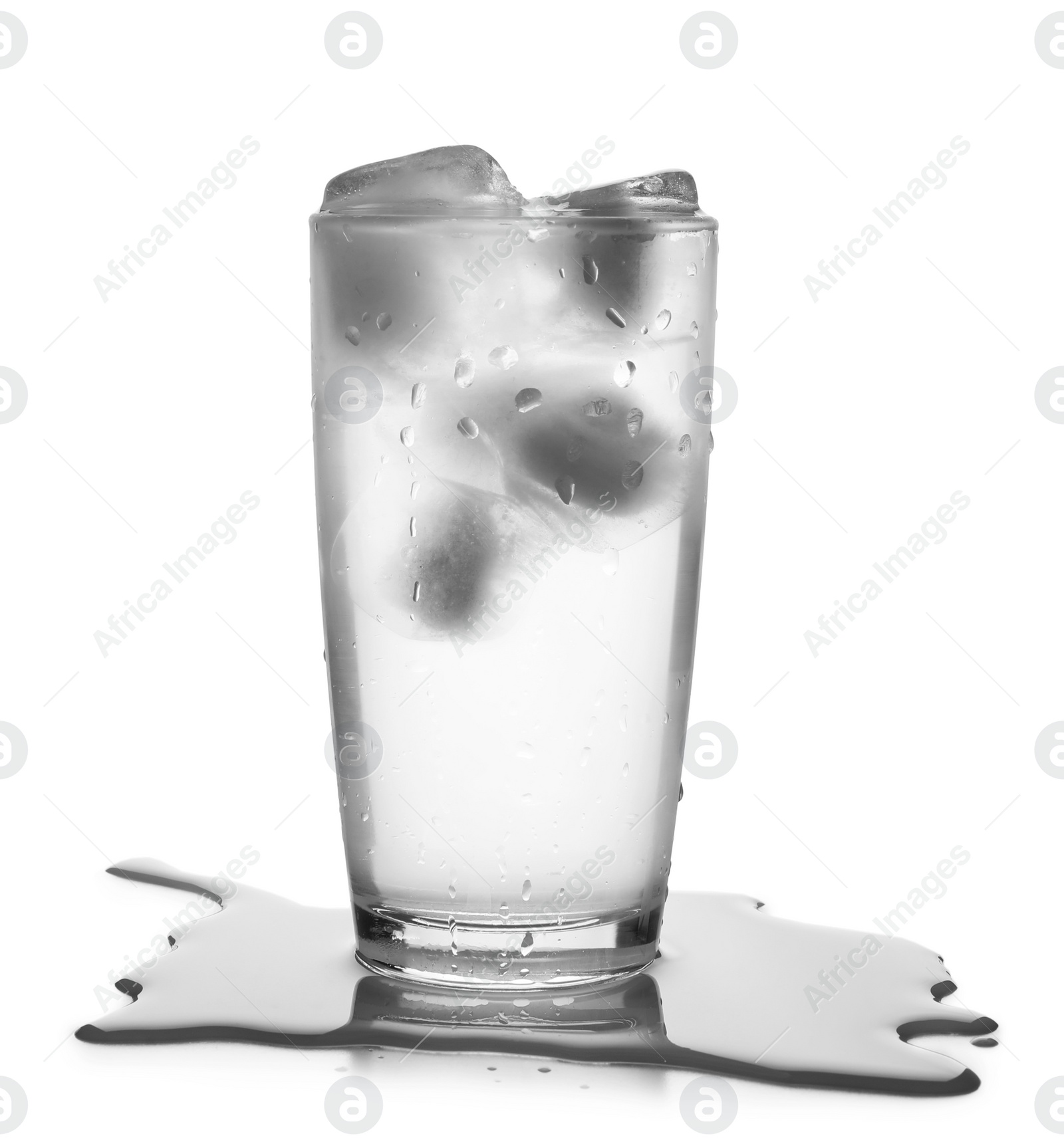 Photo of Glass of cold clear water with ice on white background. Refreshing drink