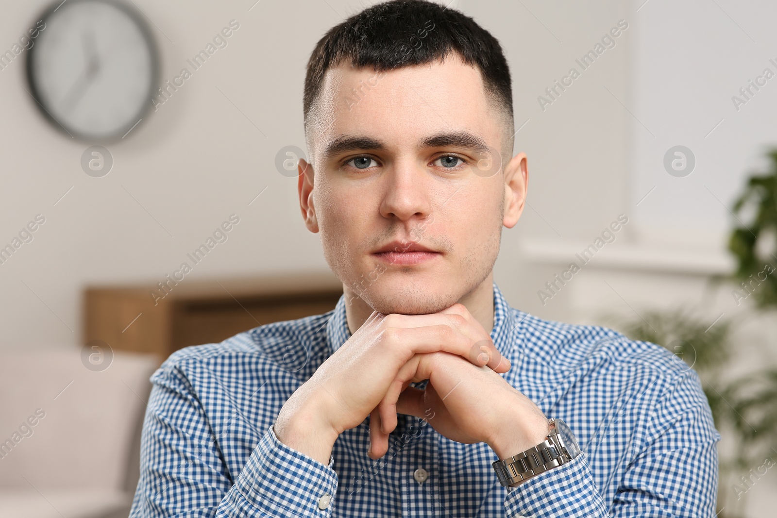 Photo of Young man having online video call at home, view from web camera