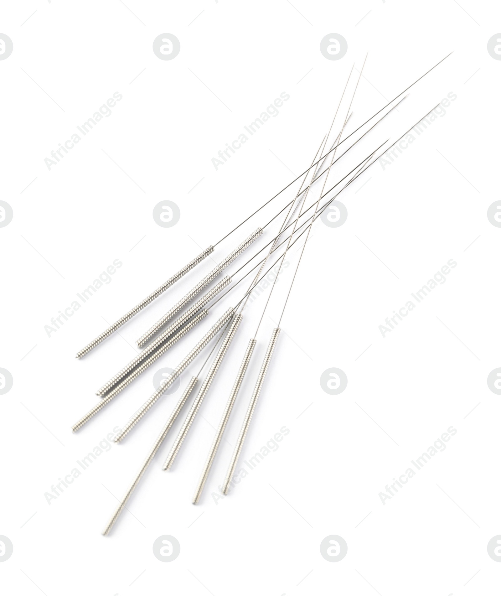 Photo of Many needles for acupuncture on white background