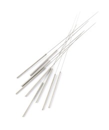 Photo of Many needles for acupuncture on white background