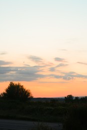 Picturesque view of beautiful countryside at sunset