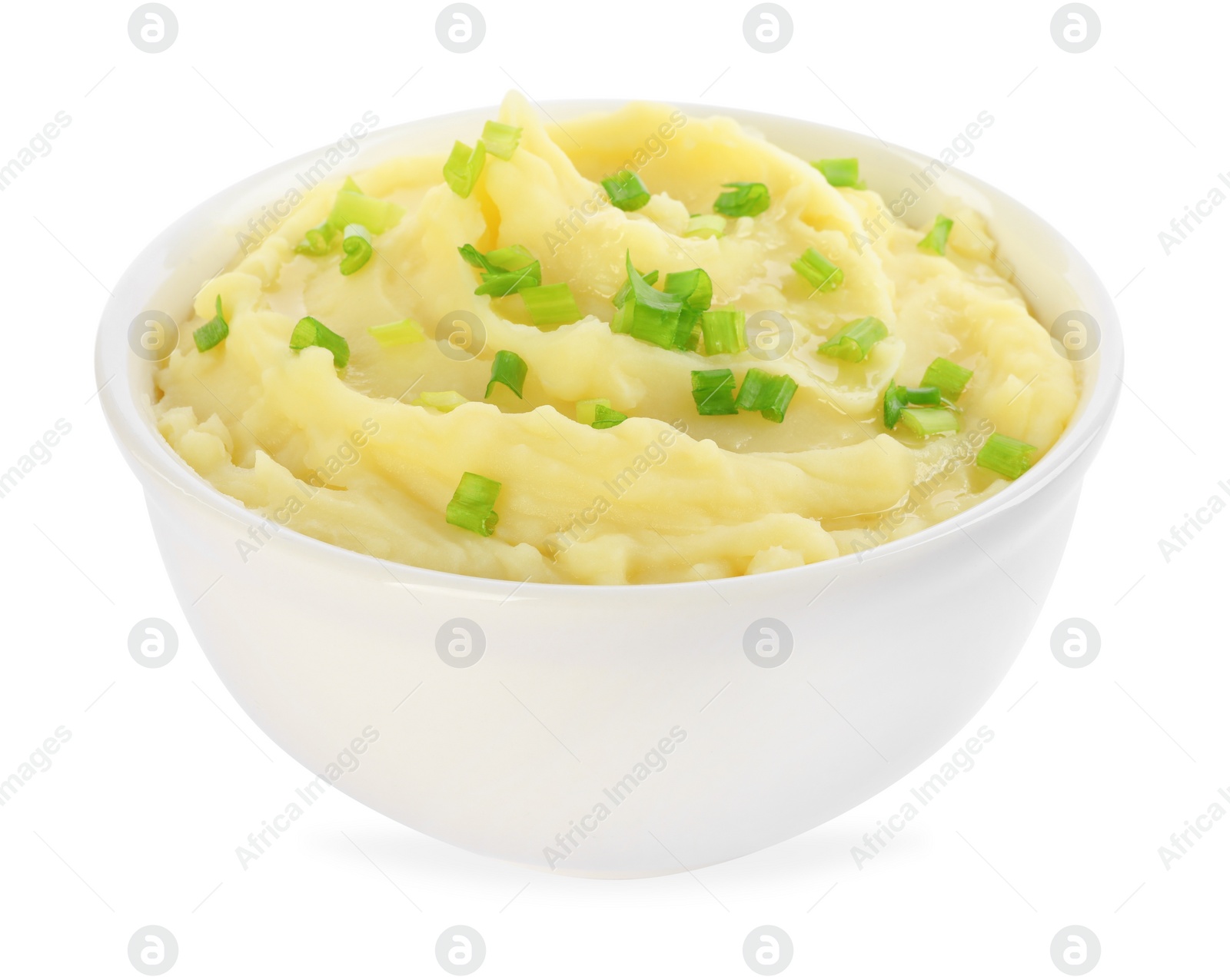 Photo of Bowl of tasty mashed potato with green onion isolated on white