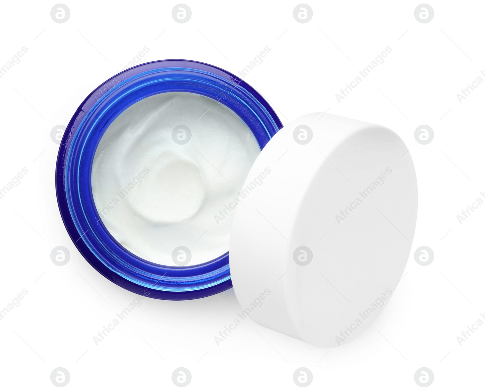 Photo of Open jar with moisturizing cream isolated on white, top view