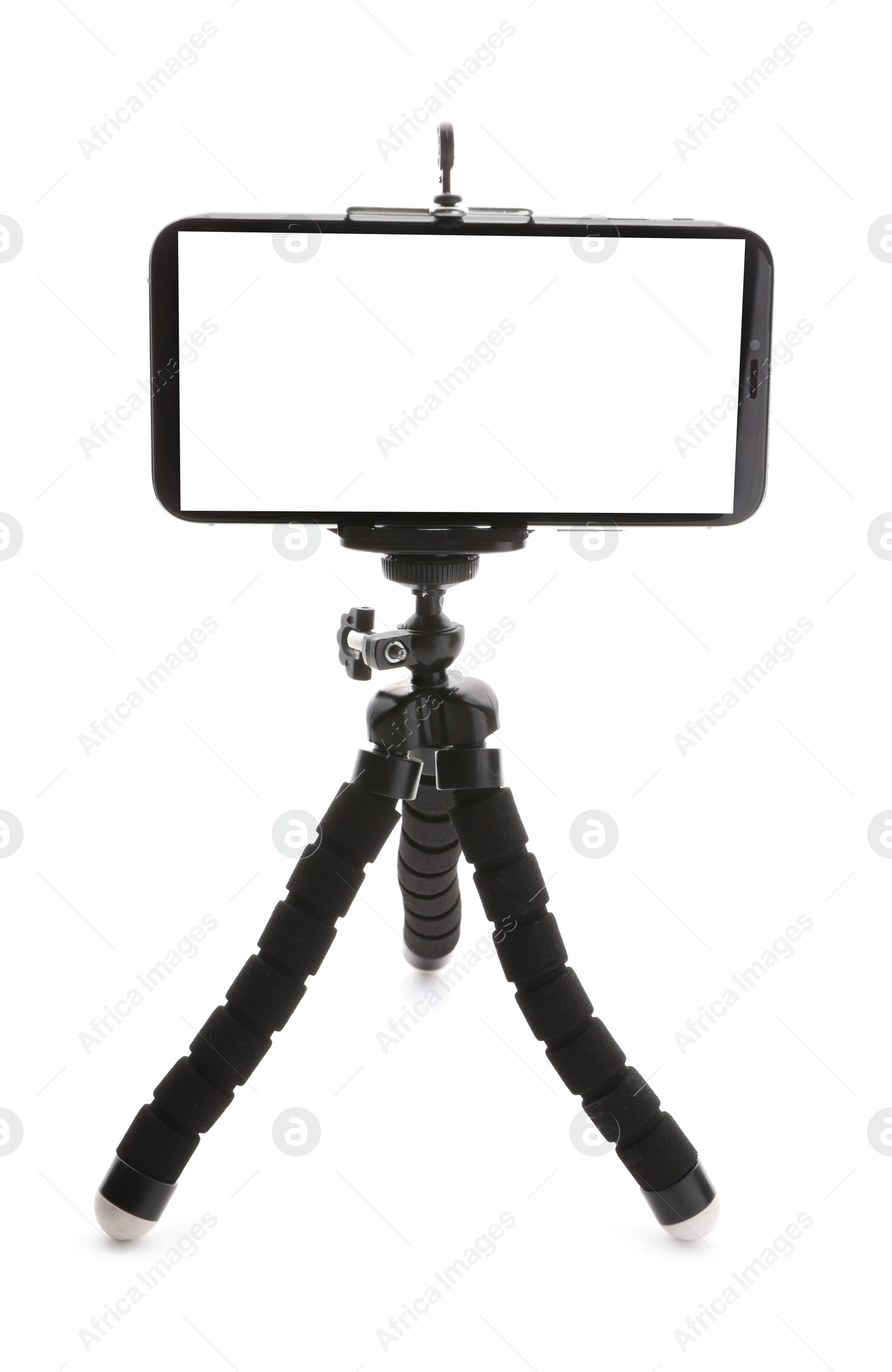 Photo of Modern tripod with smartphone isolated on white