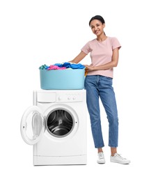 Photo of Beautiful woman with laundry basket near washing machine on white background