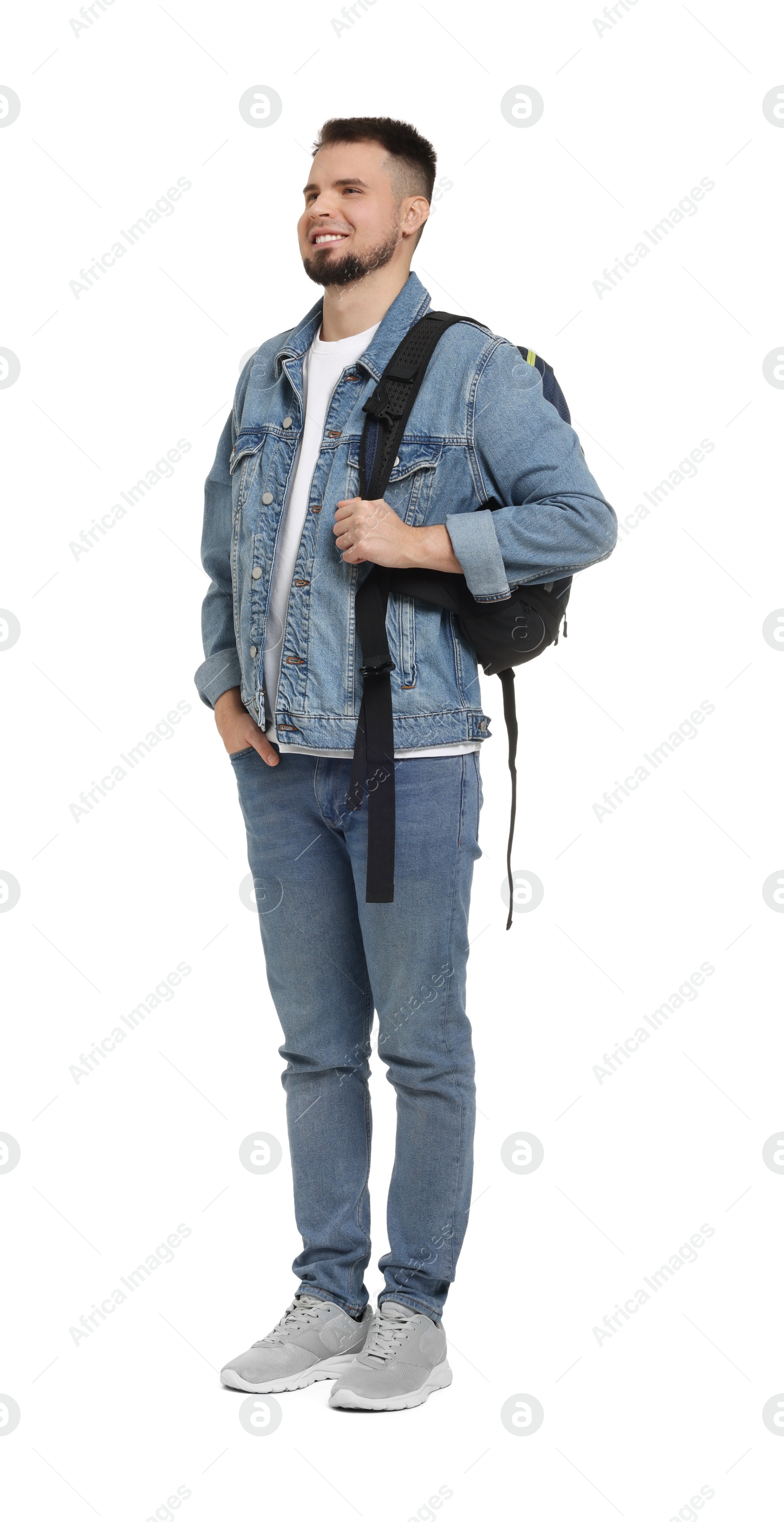 Photo of Man with backpack in denim clothes isolated on white