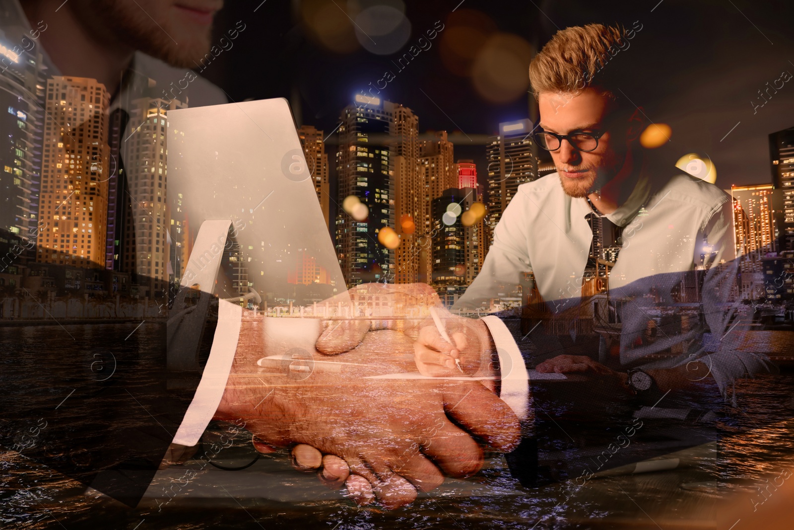 Image of Multiple exposure of partners shaking hands, man working in office and night cityscape. Business corporation 