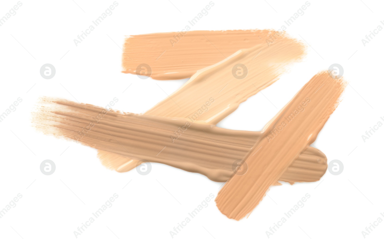 Photo of Samples of liquid skin foundations on white background, top view