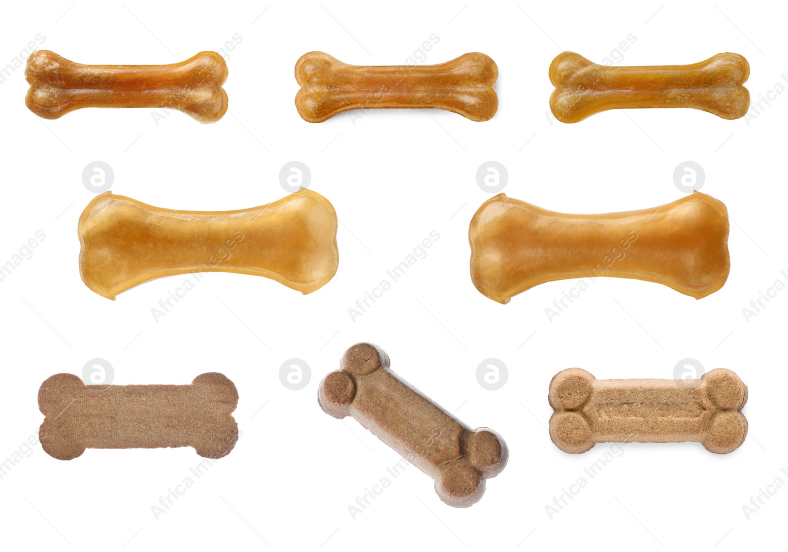 Image of Set with different bone dog treats on white background